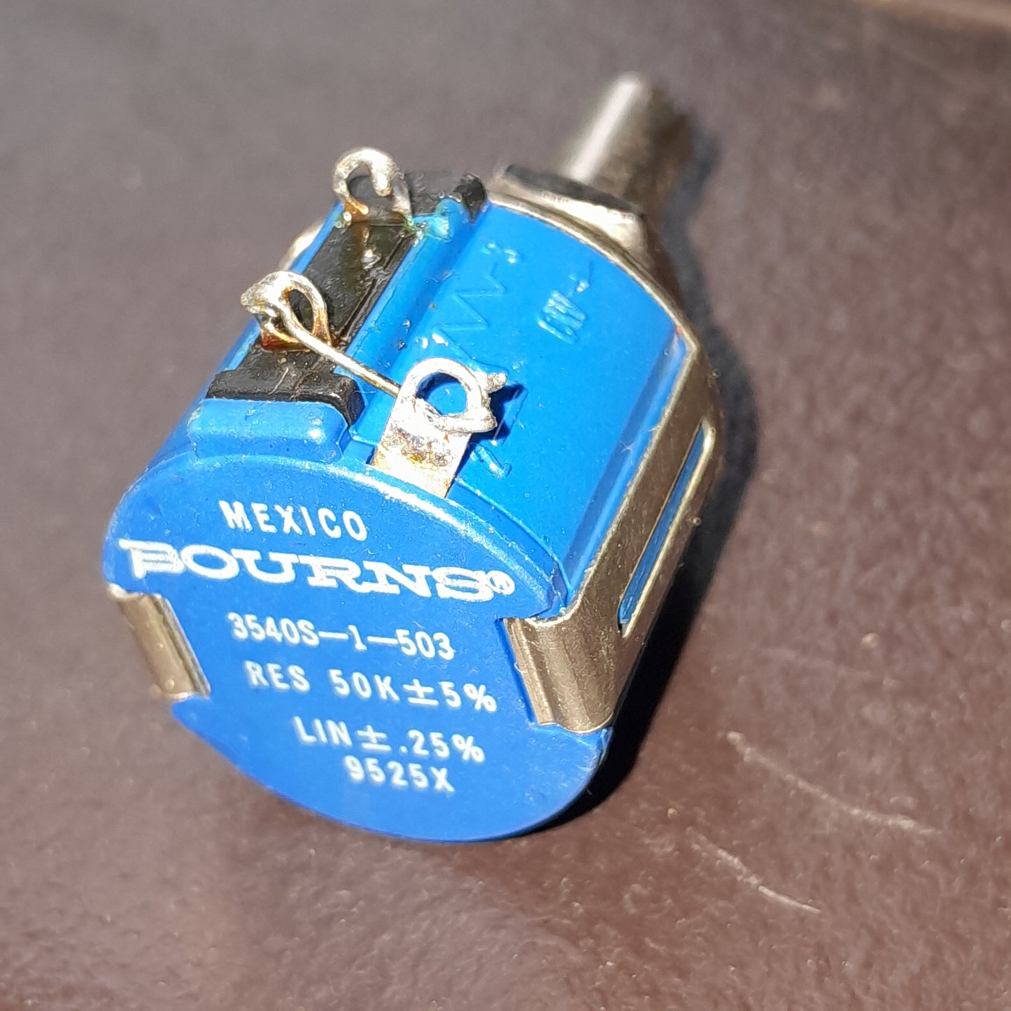 Bourns Precision Multiturn Potentiometer. With 10 turns, a 50 kΩ resistance, and a ±5% tolerance.